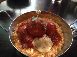 Spicy Pork Meatballs with Marinara on Tomato Risotto